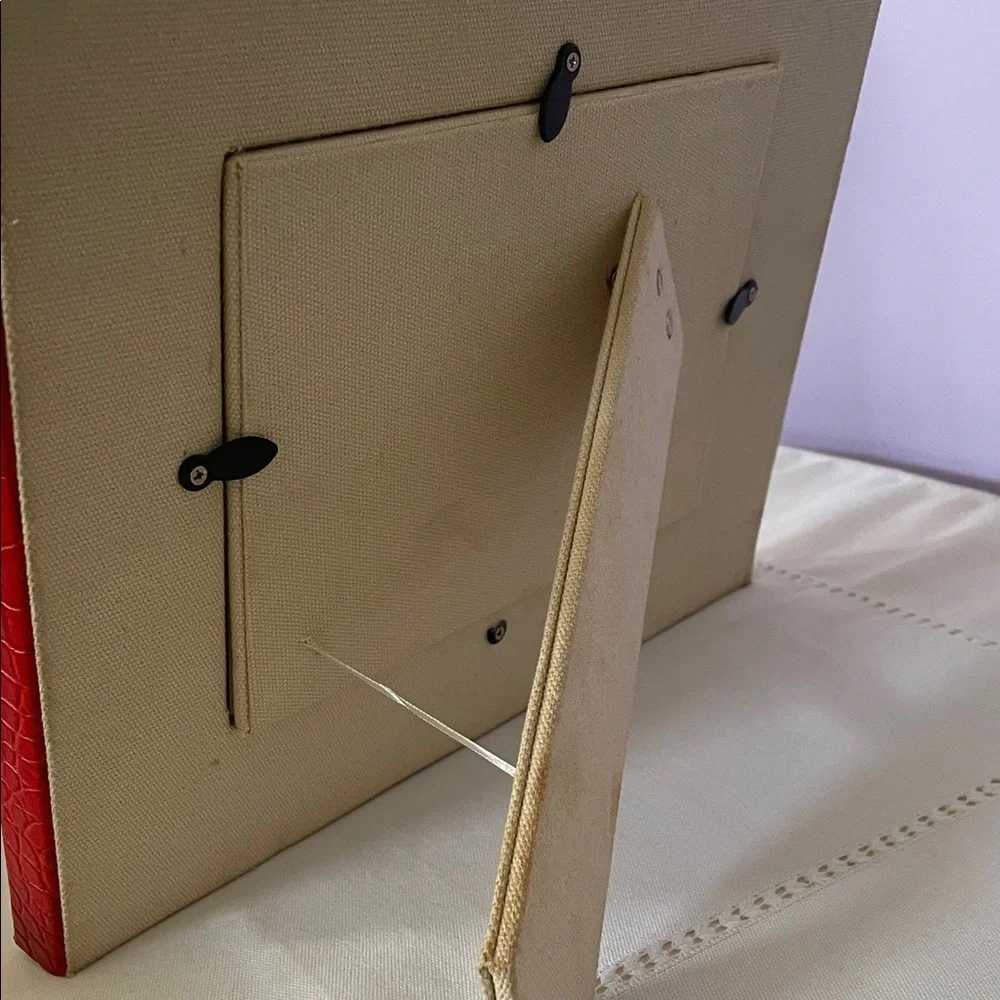 Red  leather trim picture frame holds 5x7